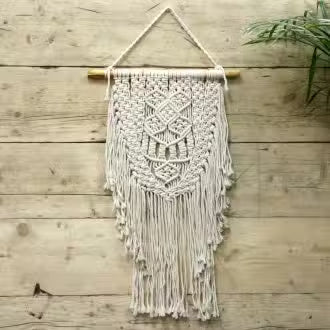 Minimalist boho macrame wall hanging art — Handmade cotton rope wall decor for chic bedroom interiors, bohemian nurseries, and modern neutral home styling.