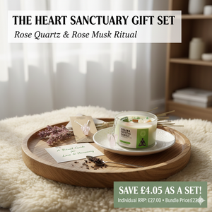 Luxury Heart Sanctuary gift set featuring a Rose Musk crystal candle with Rose Quartz and Jade, plus a hand-carved Rose Quartz angel pendant — Complete heart chakra ritual kit for love and self-care.