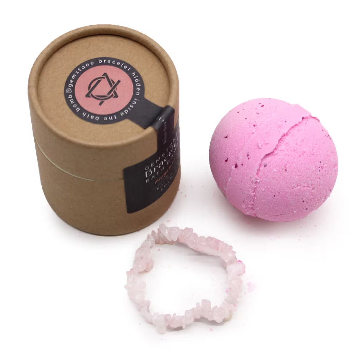 Luxury Rose Quartz Glow bath bomb with a hidden gemstone bracelet inside — Artisan bath fizzy scented with wild rose and patchouli for self-love and heart chakra wellness.